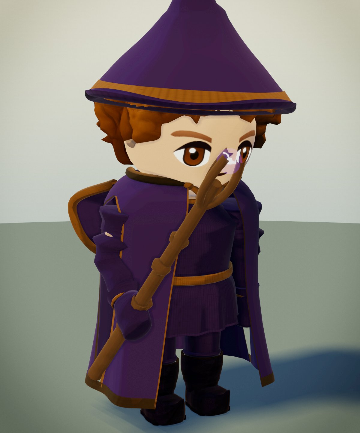 A character dressed as a Mage, holding a staff.